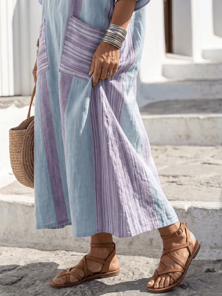 Emma & Rose Cape Town Orien™ Flow Pocket Midi Dress with lightweight fabric, featuring flowy silhouette and side pockets.