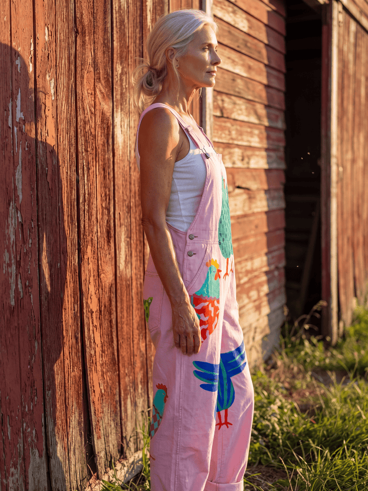 Sanna™ Hen Motif Jumpsuit by Emma & Rose Cape Town featuring a stylish jumpsuit with hen print and playful design.