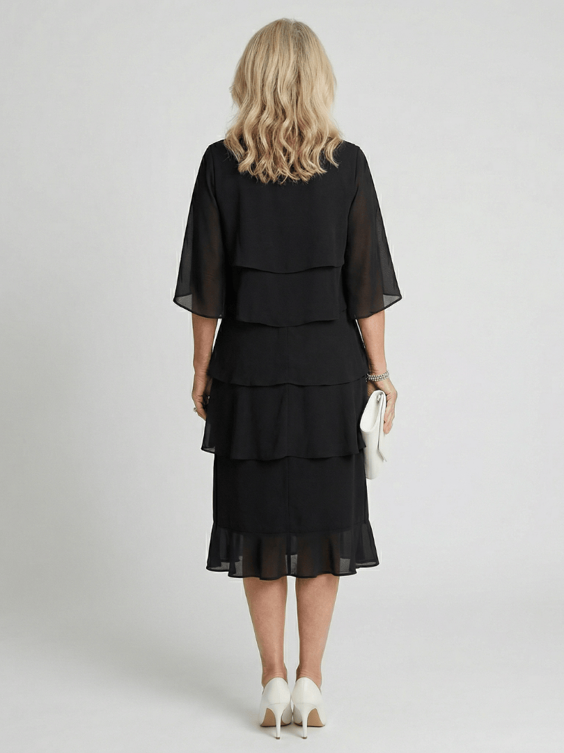 Emma & Rose Cape Town Brent™ layered tier midi dress with flowing fabric and stylish tiered design, perfect for elegant occasions.