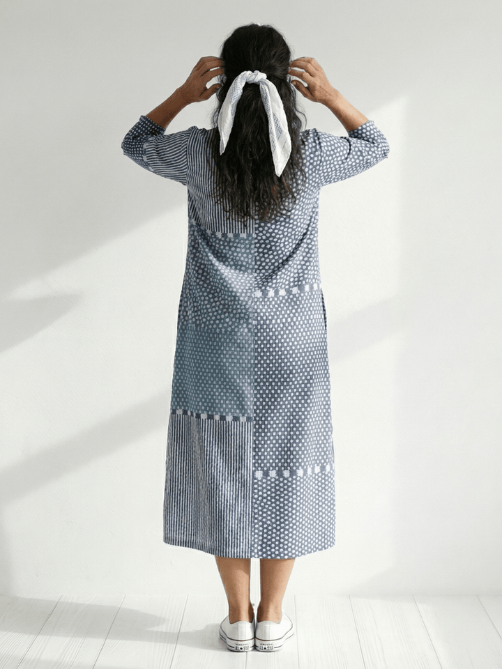 Nolan™ Fit Patchwork Midi Dress by Emma & Rose Cape Town featuring a stylish, multicolored patchwork design and midi length.