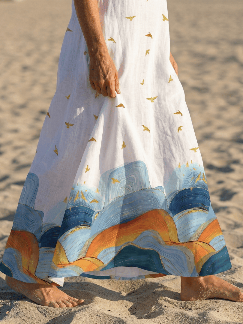 Caelia™ Calm Line maxi dress by Emma & Rose Cape Town, featuring flowing fabric and elegant design, displayed on a hanger.