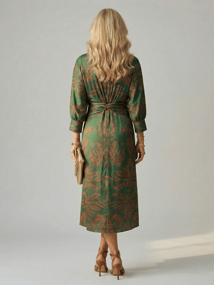 Lune™ Natural Wrap Midi Dress by Emma & Rose Cape Town, featuring flowing fabric and elegant design, displayed on a model.