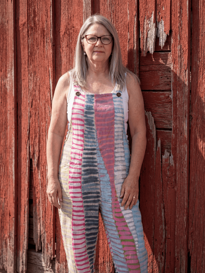 Kaelie Stripe Flow Jumpsuit by Emma & Rose Cape Town, featuring a stylish striped pattern and flowy fabric.