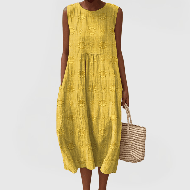 Emma & Rose Cape Town Teresa™ elegant dress with stylish pockets, shown in a natural pose highlighting the dress details.