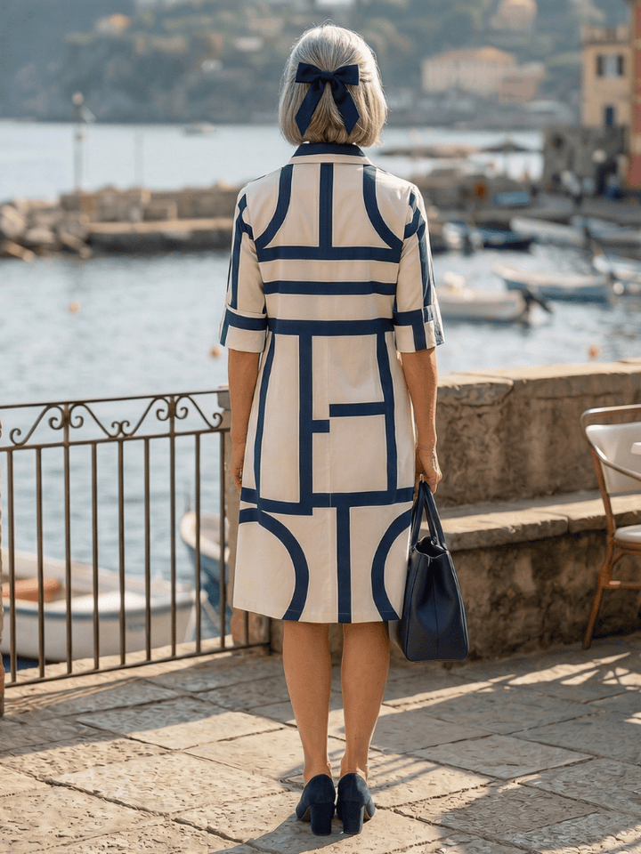 Elspeth Harbor Walk Dress by Emma & Rose Cape Town featuring a flowy fabric and nautical-inspired design.