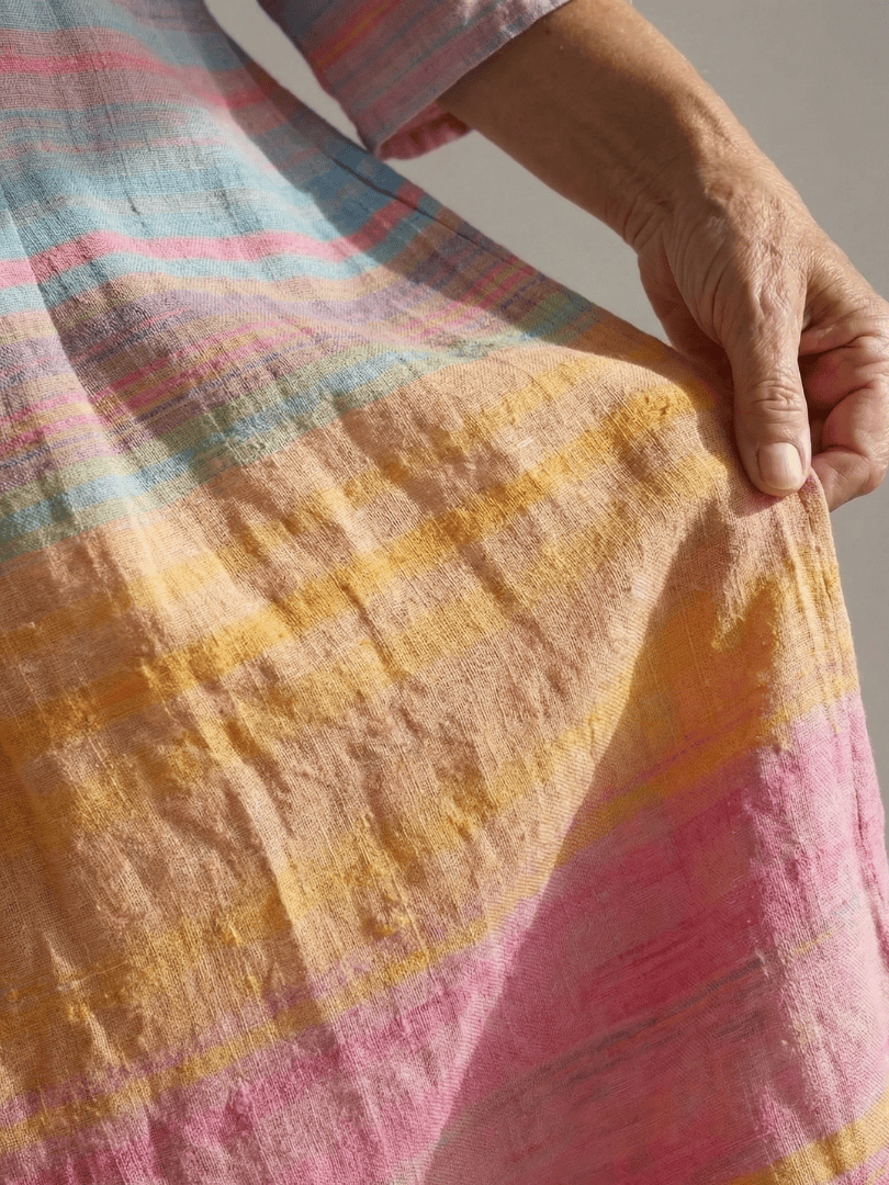 Emma & Rose Cape Town Blake™ Ease Gradient Stripe Dress showing a stylish midi dress with colorful gradient stripes and a fitted silhouette.