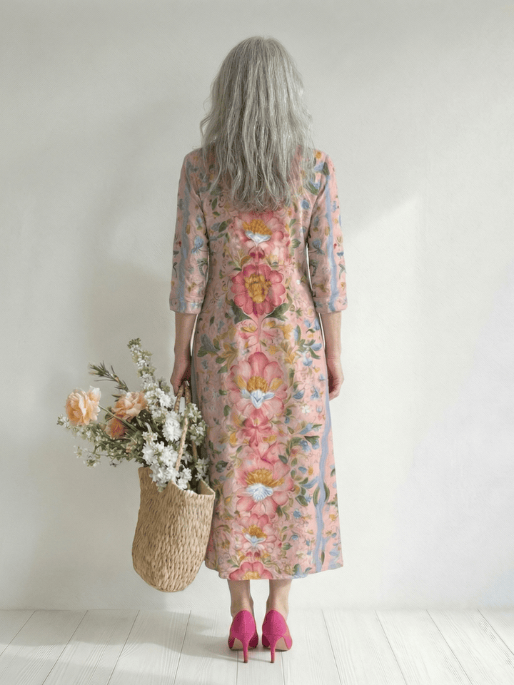 Emma & Rose Cape Town Julien™ Form Floral Midi Dress with vibrant floral pattern and flowing fabric.