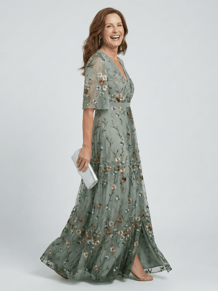 Selora Bloom Flow Maxi Dress by Emma & Rose Cape Town featuring floral print, flowing fabric, and elegant design.