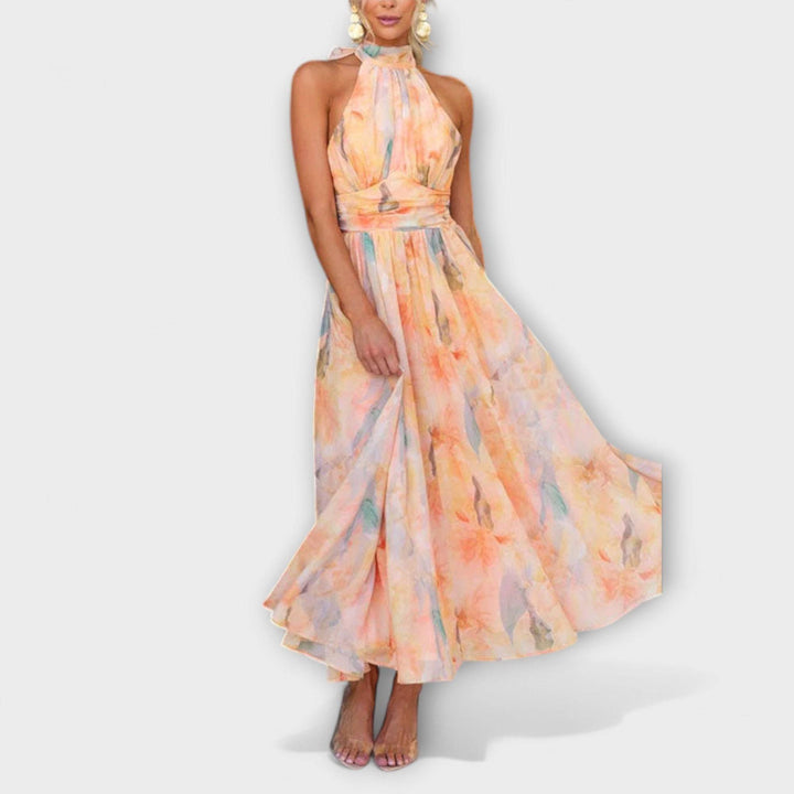 Elegant Ariellea™ dress by Emma & Rose Cape Town, featuring a flowing silhouette and intricate detailing.