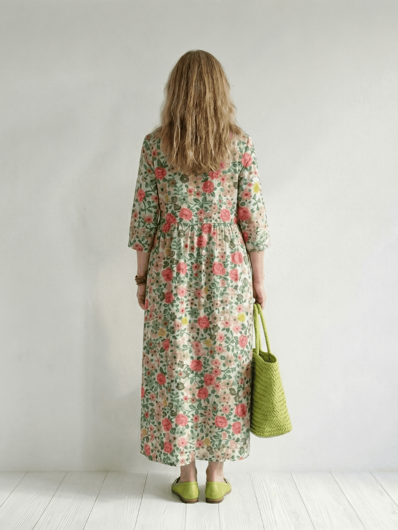 Emma & Rose Cape Town Colin™ Scatter Flower Midi Dress with a flowing silhouette and colorful floral print.