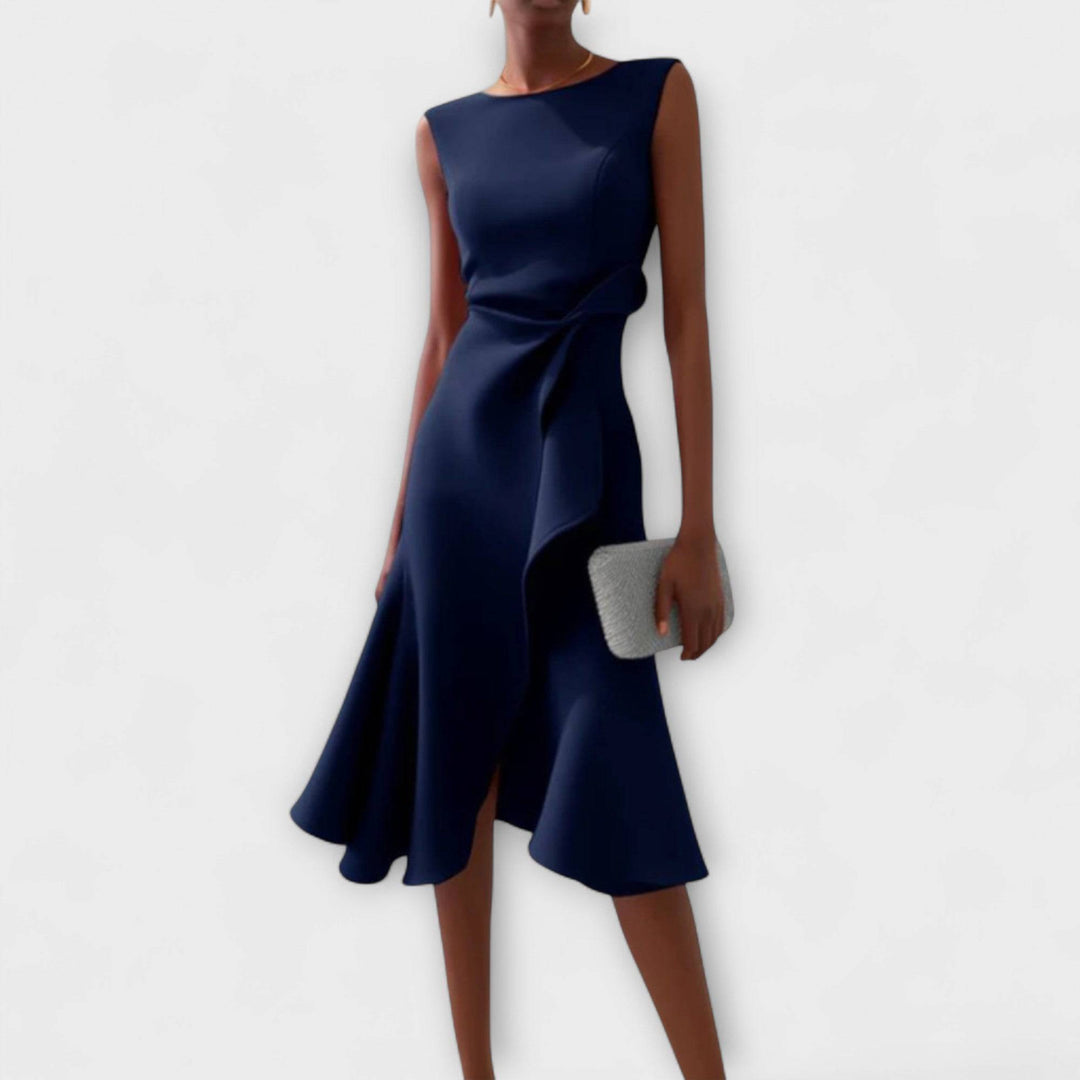 Darlene™ sophisticated midi dress by Emma & Rose Cape Town featuring elegant design and flowing fabric, displayed on a mannequin.