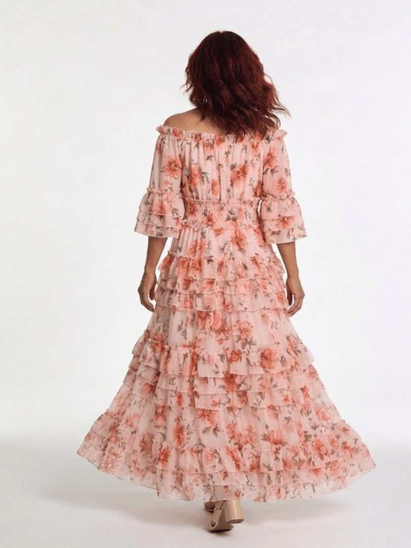 Rosalie™ ruffle tiered maxi dress by Emma & Rose Cape Town, flowing fabric with layered ruffles and a stylish, elegant design.