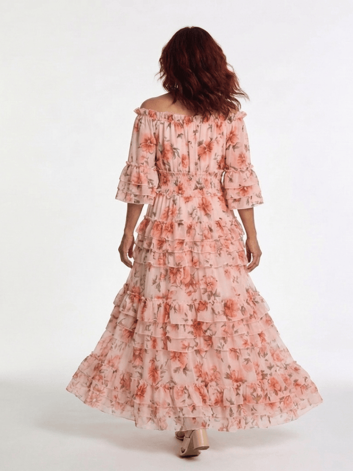 Rosalie™ ruffle tiered maxi dress by Emma & Rose Cape Town, flowing fabric with layered ruffles and a stylish, elegant design.