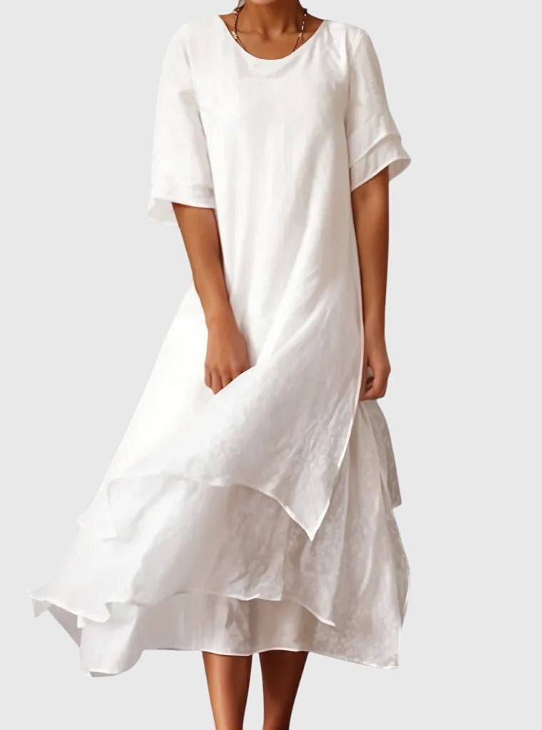 Elegant April™ dress by Emma & Rose Cape Town, featuring a flowing fabric and stylish design, shown in a full-body shot.