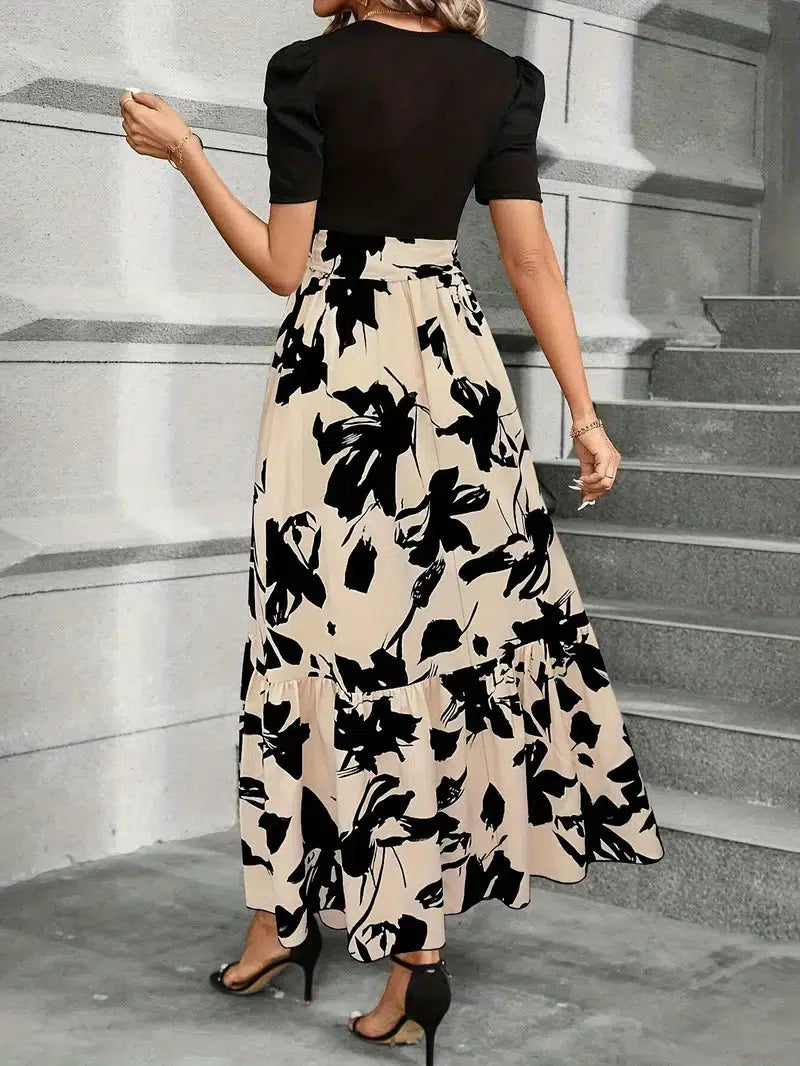 Ainhoa | Elegant dress with flowers and ruffles