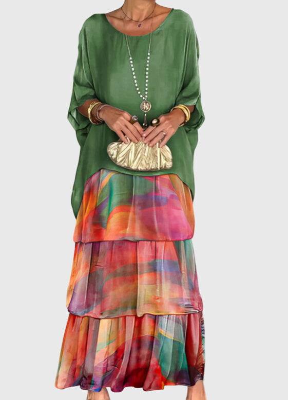 Elegant long flowing dress by Emma & Rose Cape Town, featuring a graceful design perfect for formal occasions.