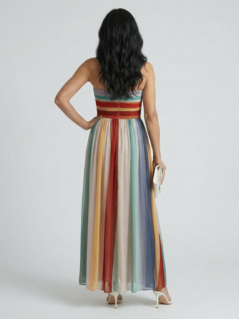 Light-colored Serene™ Light Stripe Maxi Dress by Emma & Rose Cape Town, flowing fabric and stylish striped pattern.