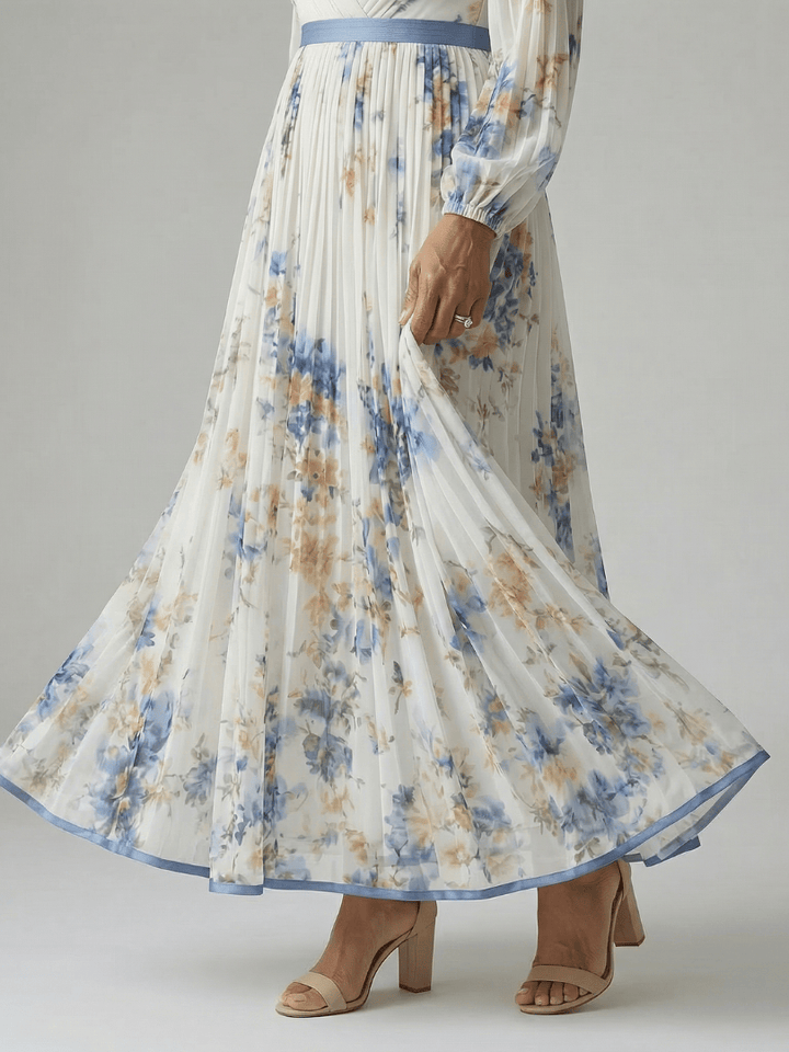 Emma & Rose Cape Town Rielle™ pleated wrap midi dress, showing the elegant pleated fabric and wrap design in a stylish midi length.