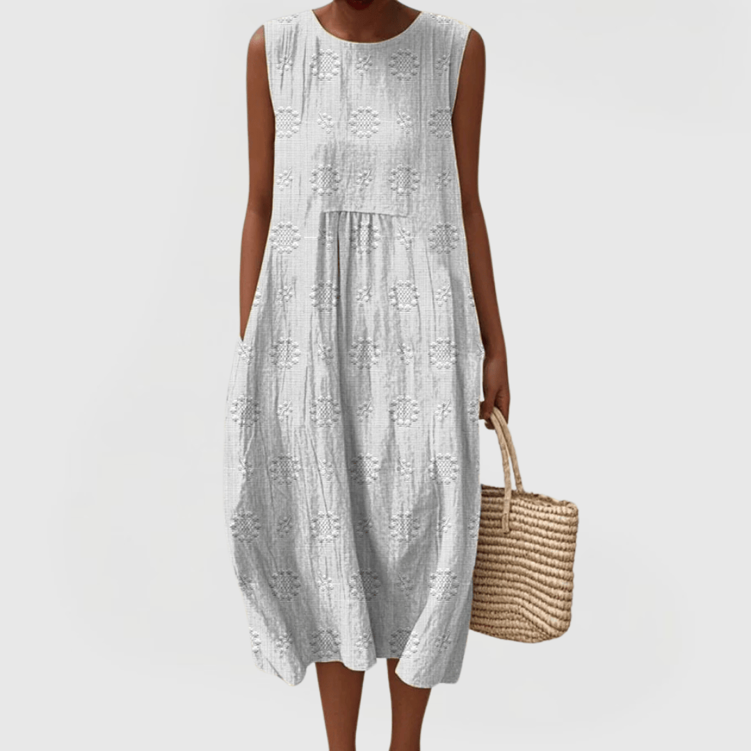 Emma & Rose Cape Town Teresa™ elegant dress with stylish pockets, shown in a natural pose highlighting the dress and pocket details.