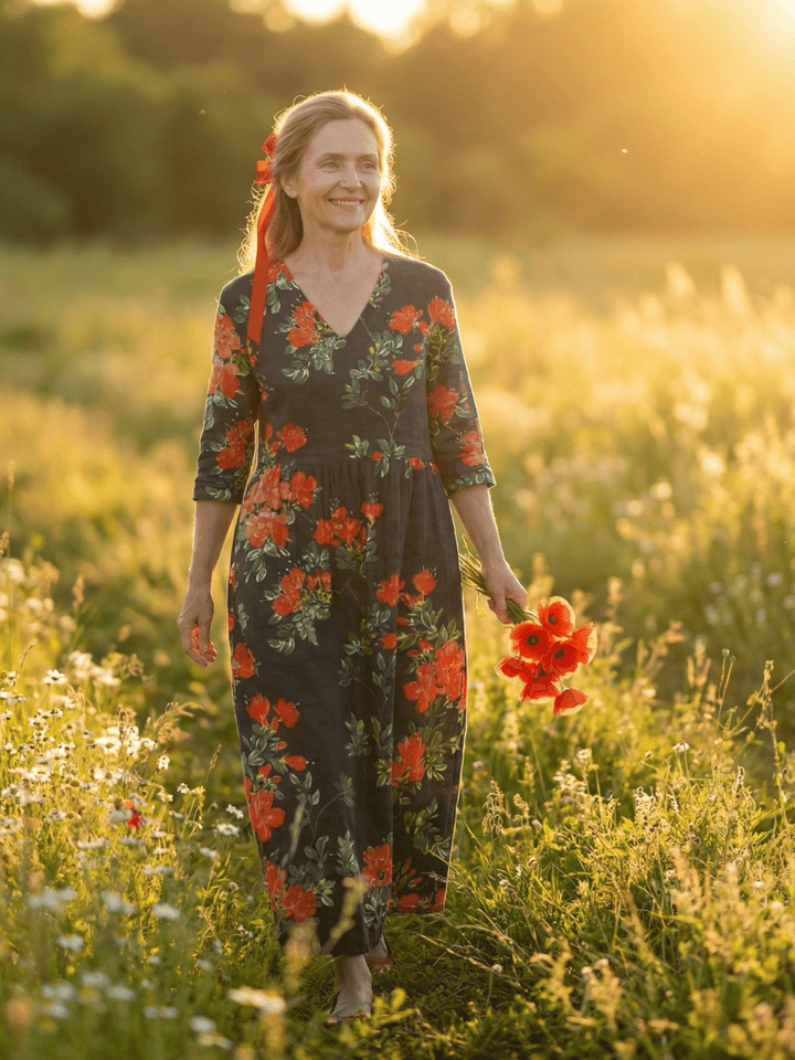 Emma & Rose Cape Town Cyrus™ floral midi dress with draped fabric, featuring a vibrant floral pattern and elegant midi length.