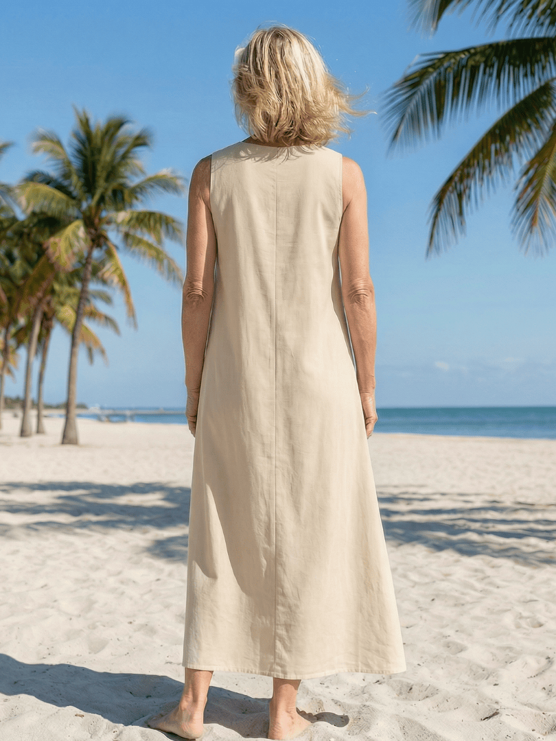 Seraya™ Gentle Fall Maxi Dress by Emma & Rose Cape Town, flowing fabric, earthy tones, and elegant design, full-length view.