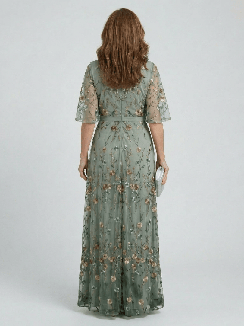 Selora™ Bloom Flow Maxi Dress by Emma & Rose Cape Town featuring floral pattern and flowing fabric, full-length view.