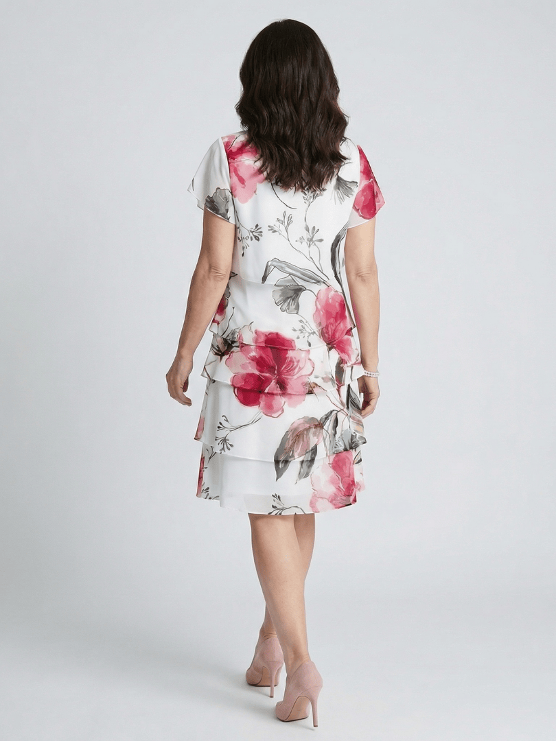 Keoni™ layered knee-length dress by Emma & Rose Cape Town, featuring a stylish, flowing design perfect for casual or dressy occasions.