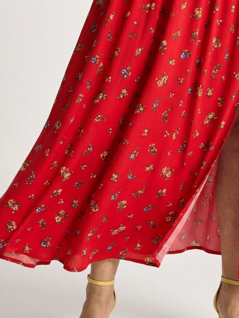 Delphine™ puff sleeve midi dress by Emma & Rose Cape Town, featuring a flowy silhouette and elegant puffed sleeves.