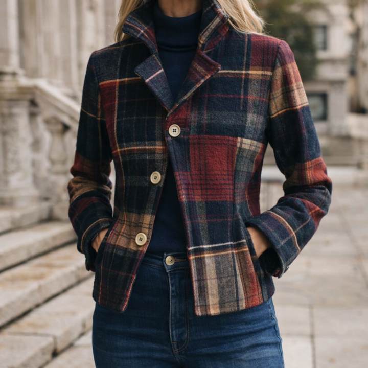 Emma & Rose Cape Town Natalie plaid mid-season coat hanging on a wooden rack, showcasing a stylish checkered design and tailored fit.