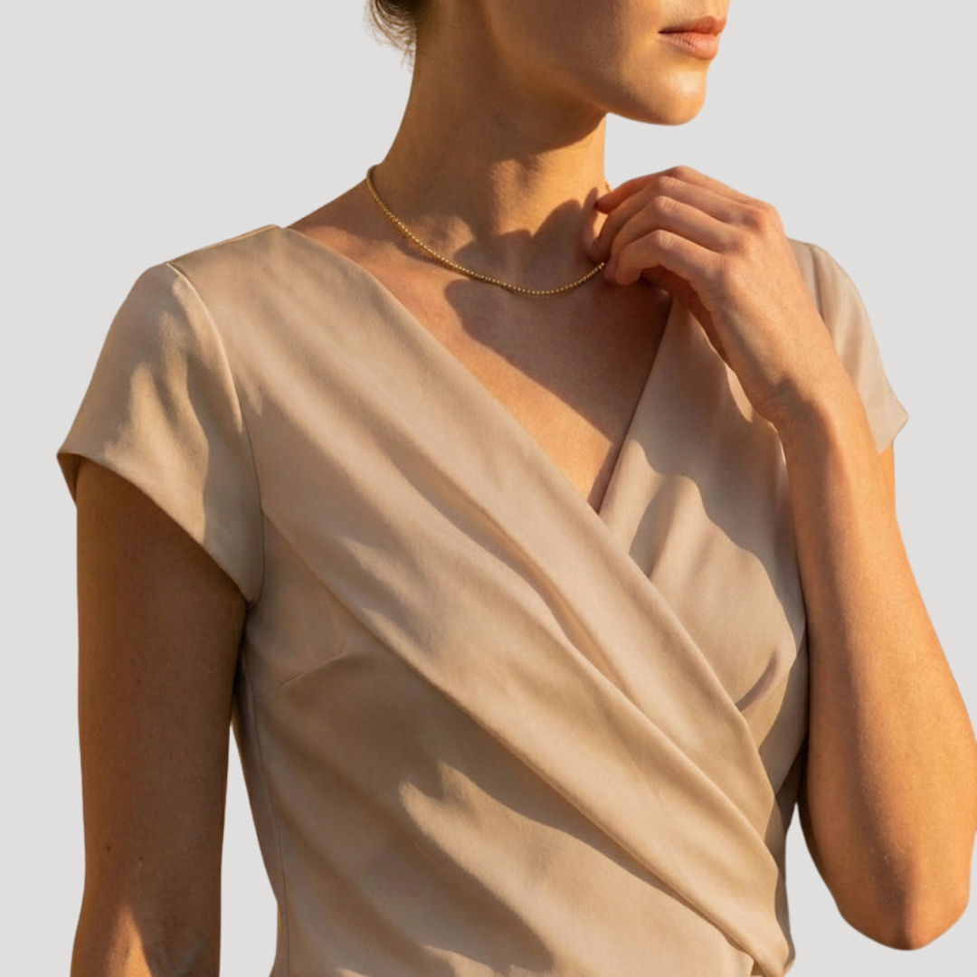 Fluid and Elegant Blouse with Draped V-Neck and Short Sleeves