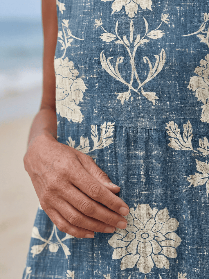 Emma & Rose Cape Town Kailo Shoreline Floral Midi Dress featuring a vibrant floral pattern and flowing silhouette.