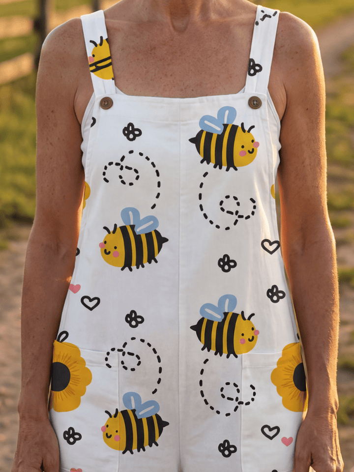 Emma & Rose Cape Town Moxie™ Bee Flower jumpsuit with floral pattern, sleeveless design, and relaxed fit.