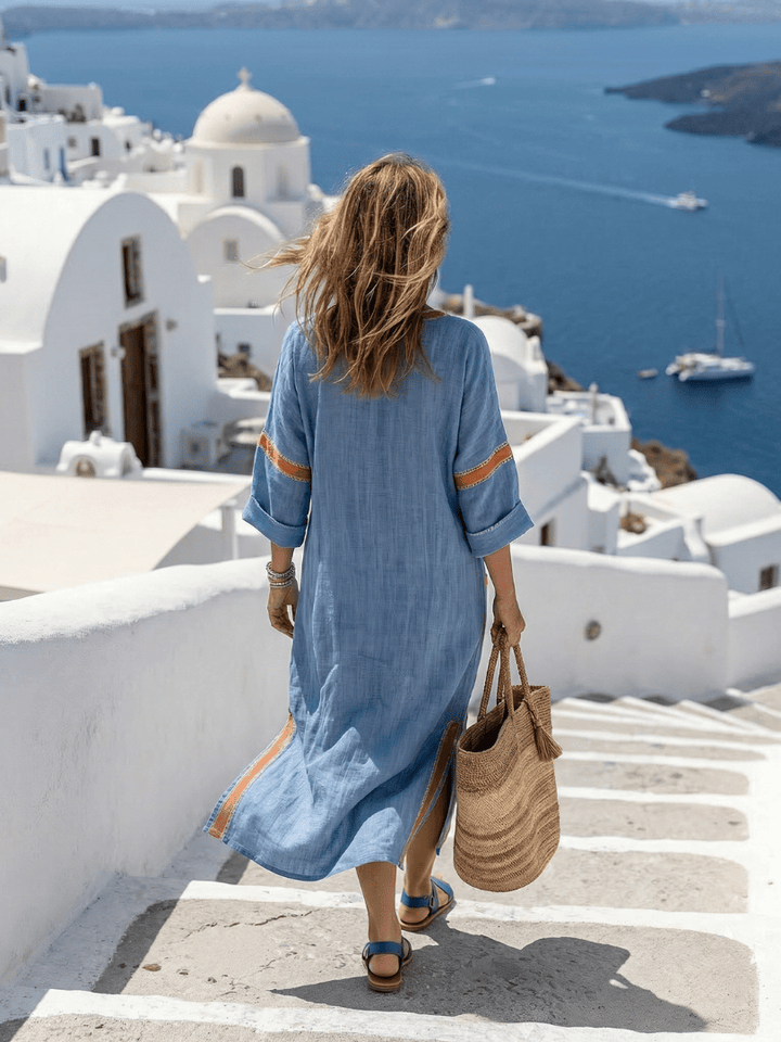 Avenor™ Soft Structure Midi Dress by Emma & Rose Cape Town, featuring a flowing silhouette and elegant design, displayed on a model.