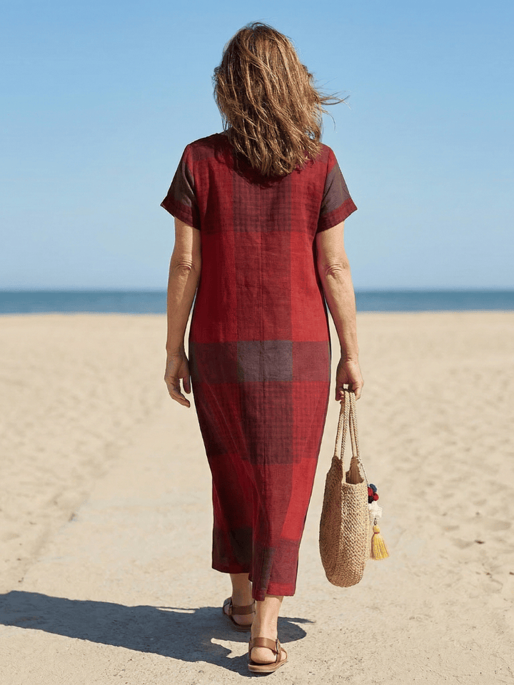 Alaia™ Relaxed Line Midi Dress by Emma & Rose Cape Town, showcasing a flowing, casual fit with a relaxed silhouette in soft fabric.