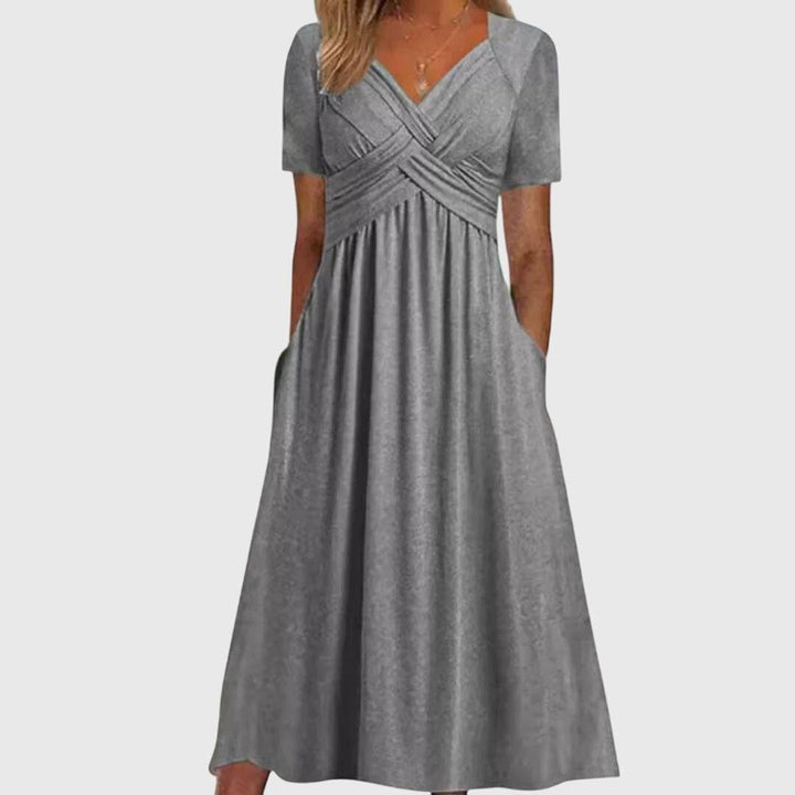 Amanda™ flattering dress by Emma & Rose Cape Town, stylish fitted dress with elegant design, shown in the image.