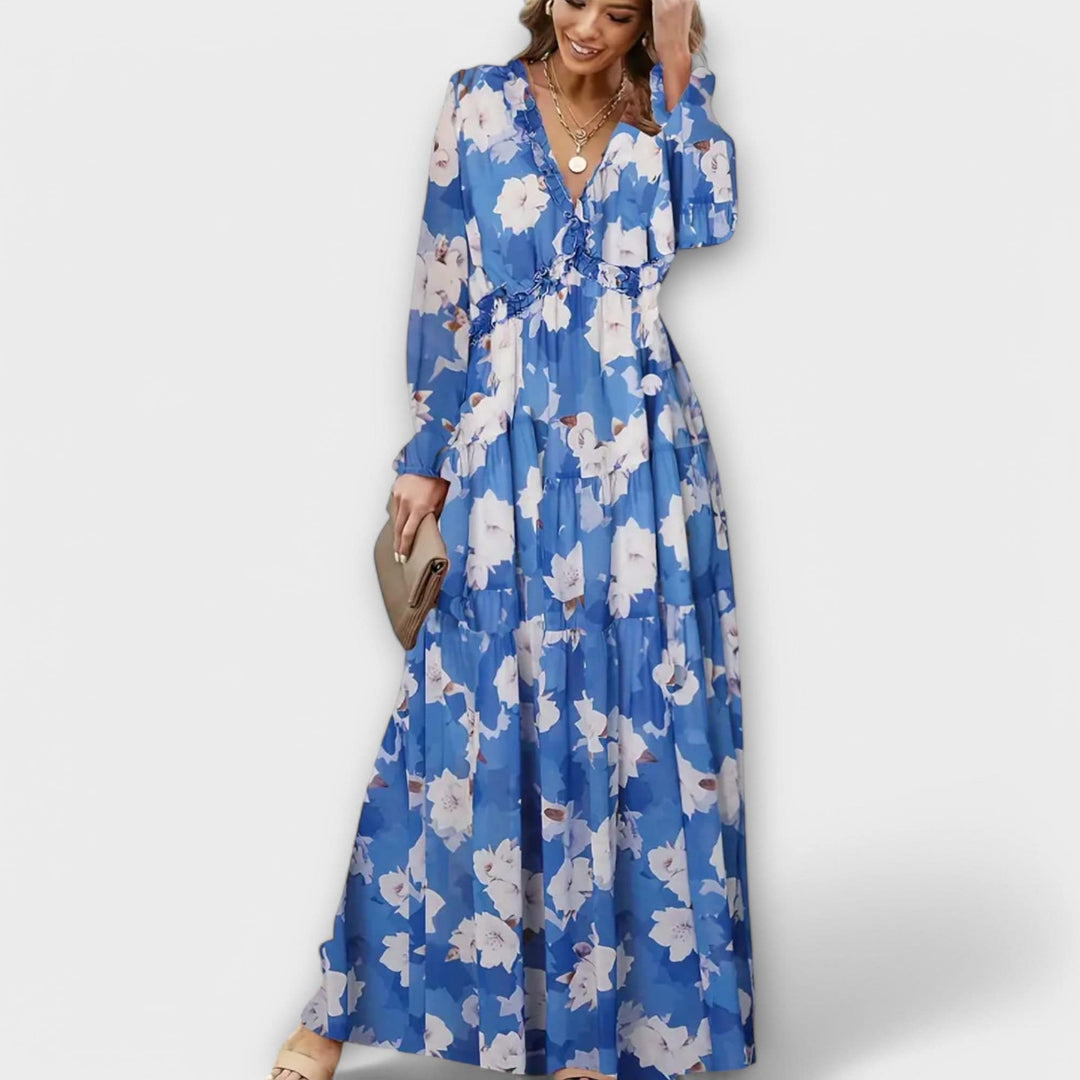 Elegant Ynah™ Maxi Dress by Emma & Rose Cape Town, featuring flowing fabric and a sophisticated silhouette.
