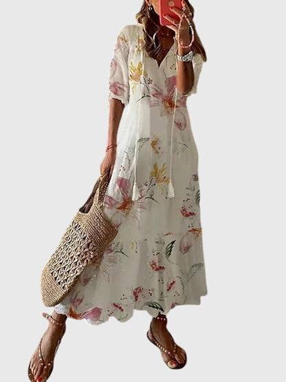 Amalia™ boho vintage summer dress by Emma & Rose Cape Town, featuring flowy fabric and floral patterns.