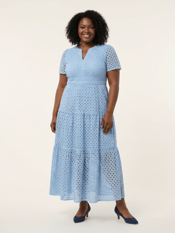 Emma & Rose Cape Town Brielle V-neck short dress, lightweight fabric, elegant fit, and stylish design shown on a model.