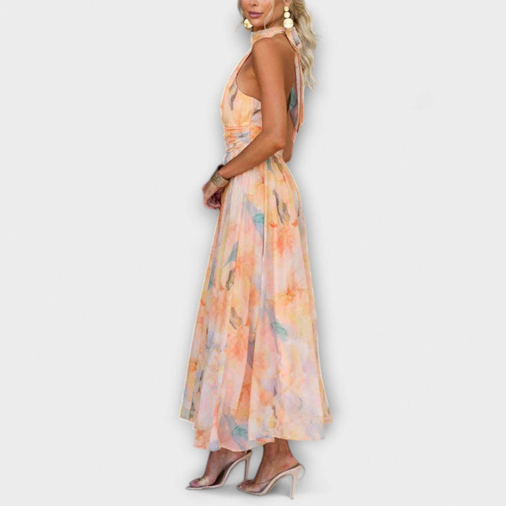 Elegant Ariellea™ dress by Emma & Rose Cape Town shown in a flowing, stylish design with a fitted waist and soft fabric.