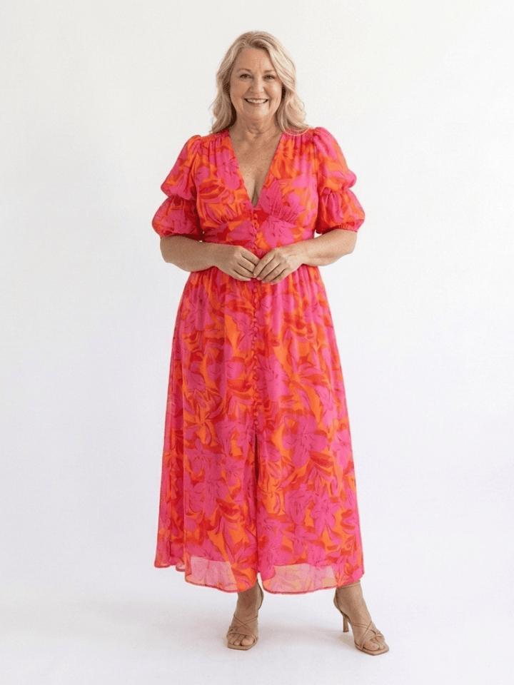 Willow™ Puff Sleeve Midi Dress by Emma & Rose Cape Town, featuring a flowy midi length, puff sleeves, and elegant design.
