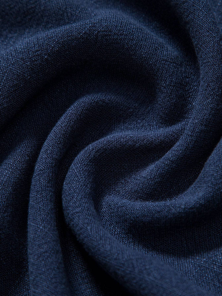 Emma & Rose Manhattan Bastian™ Deep Indigo bedding set with pillowcases and duvet cover, showcasing rich indigo fabric and elegant design.