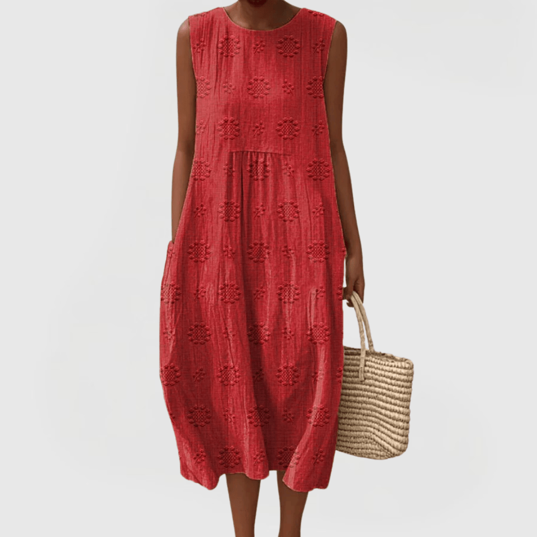 Emma & Rose Cape Town Teresa™ elegant dress showing stylish pockets and fabric detail in a well-lit setting