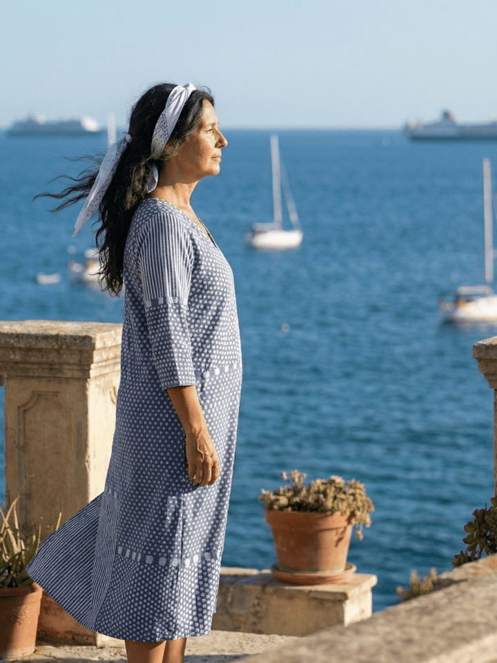 Nolan™ Fit Patchwork Midi Dress by Emma & Rose Cape Town, featuring a stylish patchwork design and midi length, displayed on a mannequin.