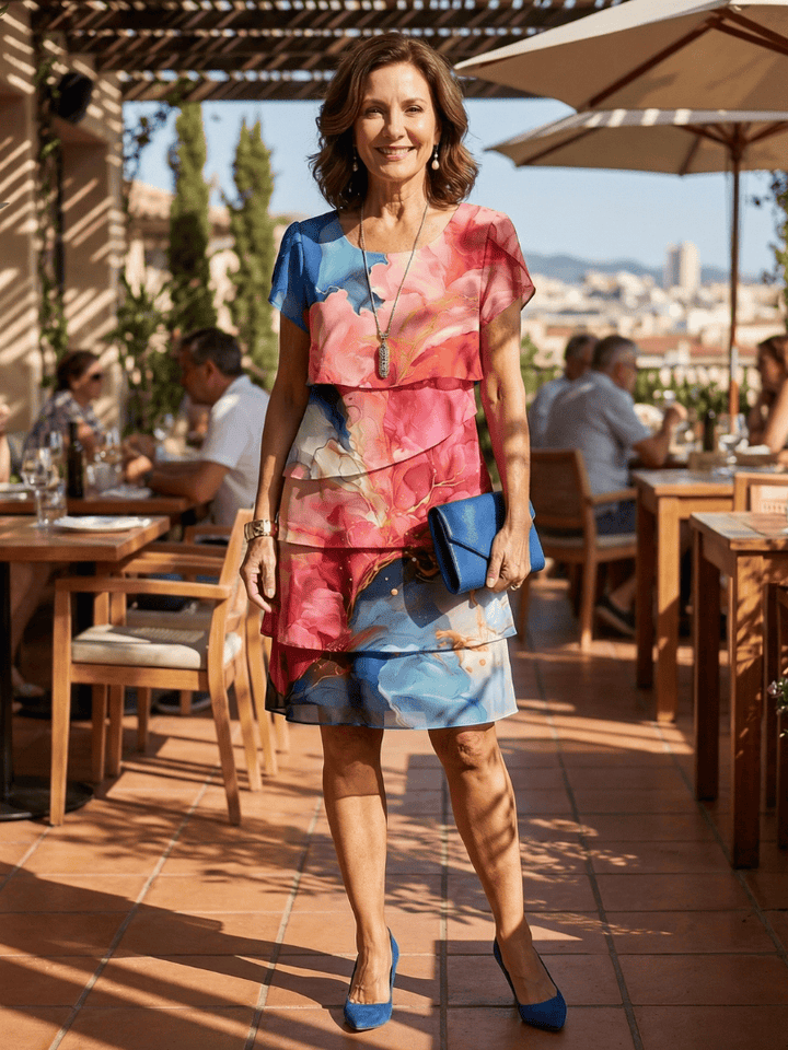Marble-patterned Mira™ knee-length dress by Emma & Rose Cape Town, featuring a fitted silhouette and elegant design.