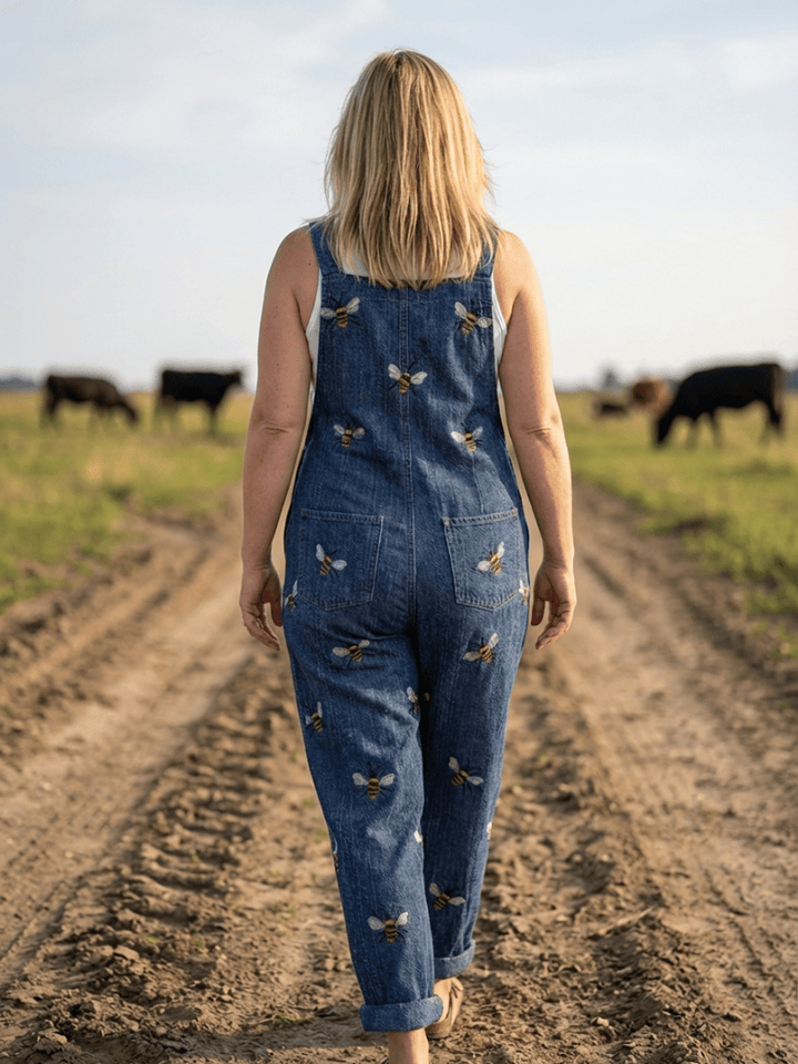 Rhea™ Bee Strap Jumpsuit by Emma & Rose Cape Town featuring a stylish bee print and adjustable shoulder straps.