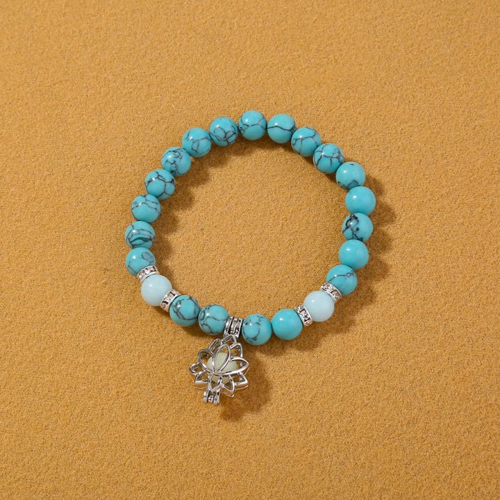Beaded Bracelet with Luminous Lotus Pendant