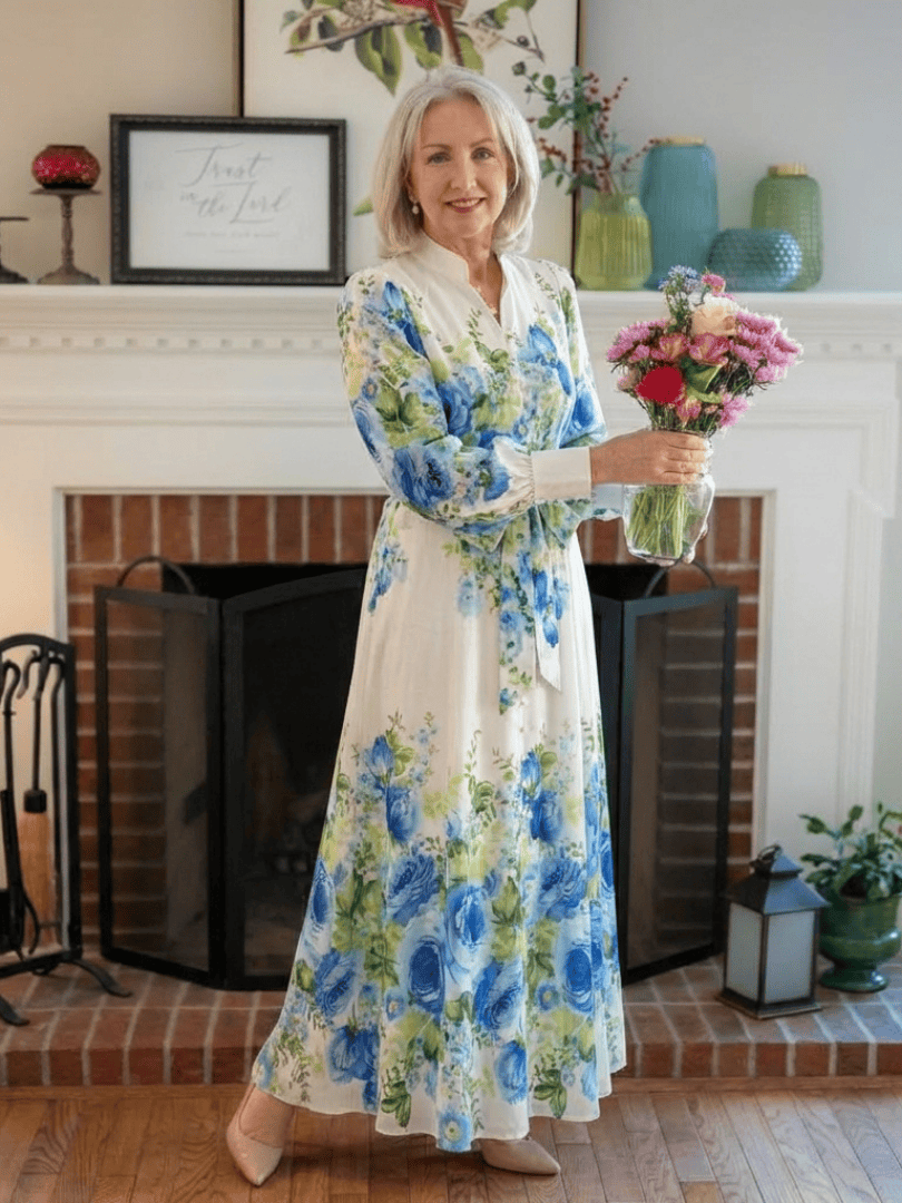 Emma & Rose Cape Town Harper™ button front maxi dress in flowy fabric, shown with a fitted waist and long sleeves.