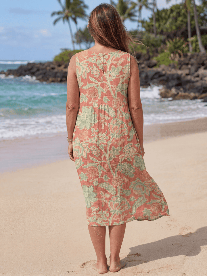 Maui Beach Midi Dress by Emma & Rose Cape Town featuring lightweight fabric, floral pattern, and casual summer style.