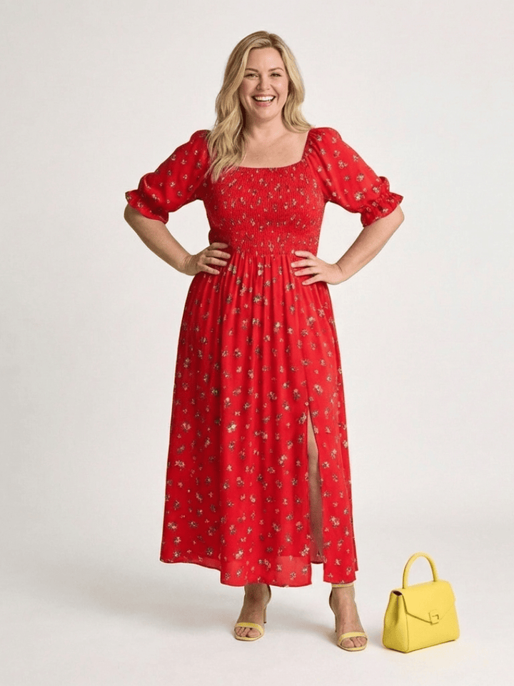 Emma & Rose Cape Town Delphine™ puff sleeve midi dress with floral pattern and fitted bodice, flowing skirt, and elegant design.
