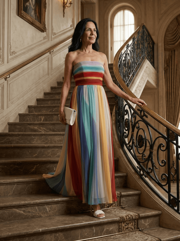 Serene™ Light Stripe Maxi Dress by Emma & Rose Cape Town featuring a flowing silhouette and soft pastel stripe pattern.